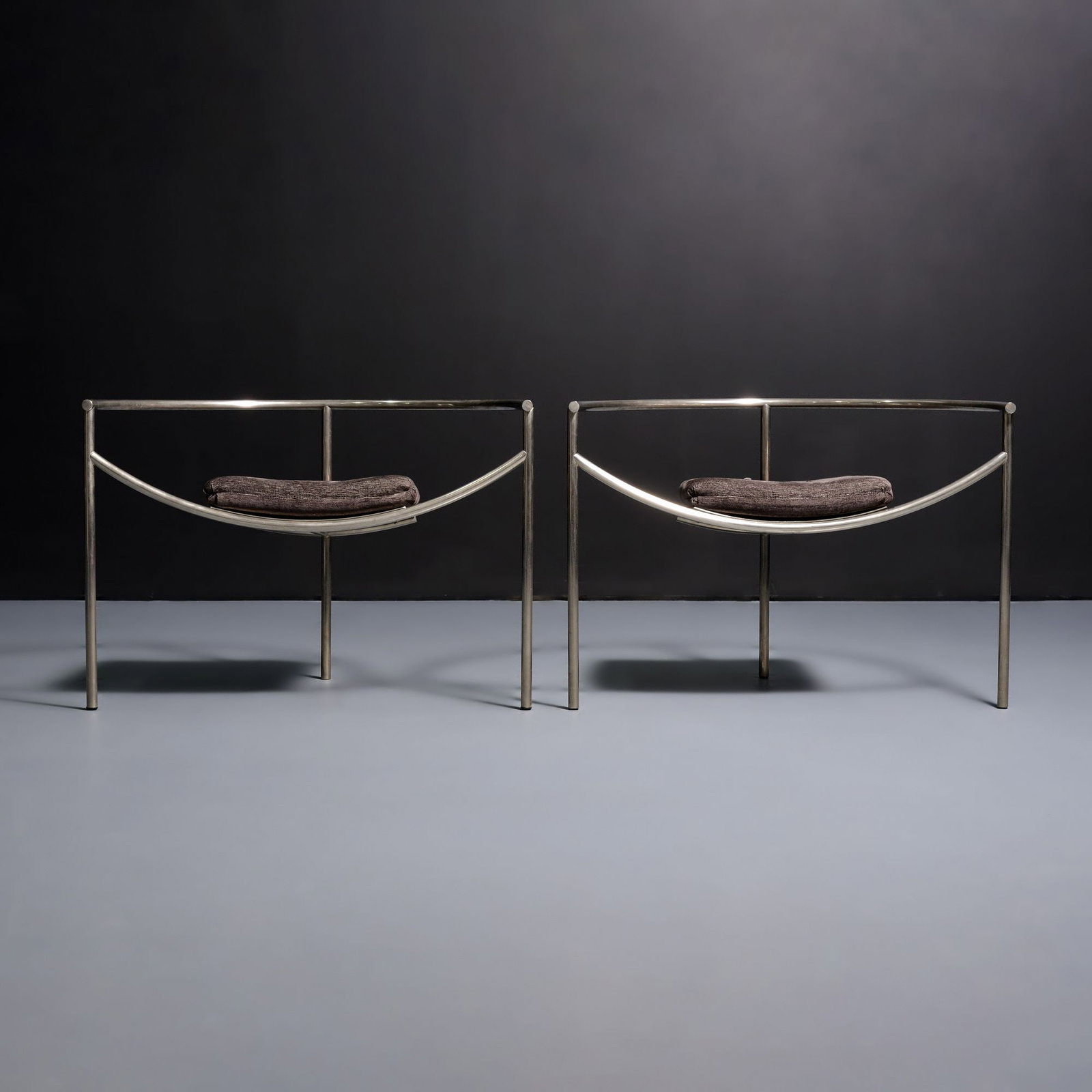 Pair of Philippe Starck DR SONDERBAR Lounge Chairs: Artist/Designer; Manufacturer: Philippe Starck (French, b. 1949)Marking(s); notes: no marking(s) apparentMaterials: chromed metal, upholsteryDimensions (H, W, D): </