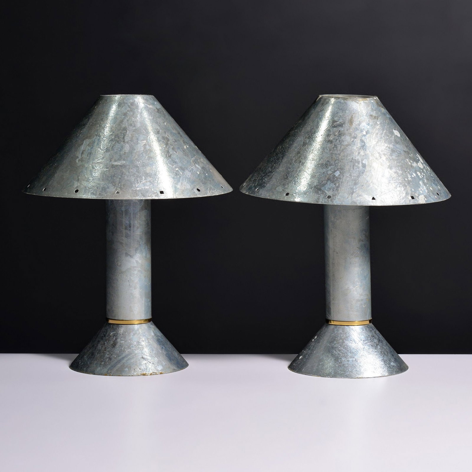 Pair of Ron Rezek Table Lamps: Artist/Designer; Manufacturer: Ron Rezek (American, b. 1946)Marking(s); notes: Ron Rezek labelMaterials: zinc, brass, enameled metalDimensions (H, W, D): 18
