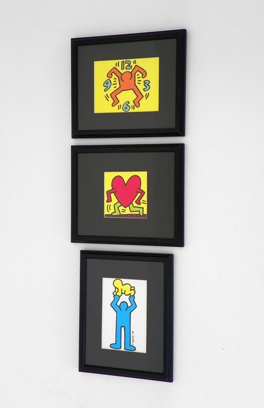 Set of 3 Framed Keith Haring Prints: Designer & Manufacturer: Keith Haring Country of Origin & Materials: American; print Additional Information & Circa: Set of 3 framed prints by Keith Haring; 20th Century Dimensions: frames 9"h, 11"w