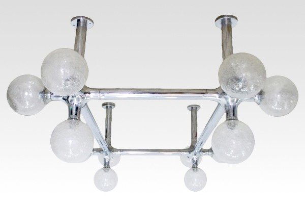 Large Peter Rockel Chandelier: Designer & Manufacturer: Peter Rockel Markings: none Country of Origin & Materials: Germany; metal, glass Additional Information & Circa: Large chandelier designed by Peter Rockel from the Palace Of T