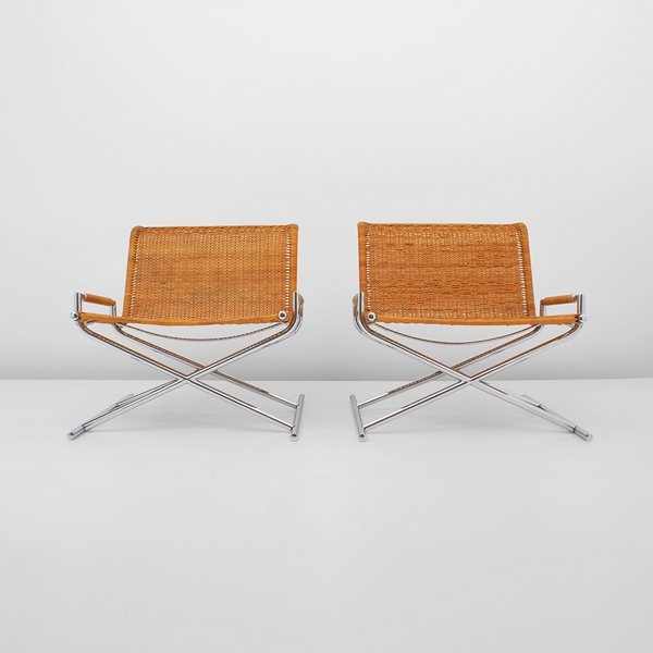 Pair of Ward Bennett "Sled" Chairs: Designer & Manufacturer: Ward Bennett; Brickell Markings: none Country of Origin & Materials: USA; metal, caning Additional Information & Circa: Pair of chromed steel and woven cane lounge chairs by W