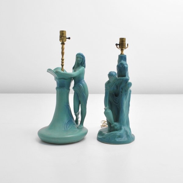 Pair of Van Briggle Figural Lamps with Shades: Designer & Manufacturer: Van Briggle Markings: probably marked under felt Country of Origin & Materials: USA; pottery, other Additional Information & Circa: Pair of figural art pottery lamps with orig