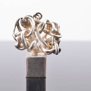 Miguel Berrocal MICRO MENTO Puzzle Sculpture / Keychain: Artist/Designer; Manufacturer: Miguel Ortiz Berrocal (Spanish, 1933-2006) Marking(s); notes: signed, marking(s) Materials: nickel-plated zamak, brass Dimensions (H, W, D): 1.75"h,