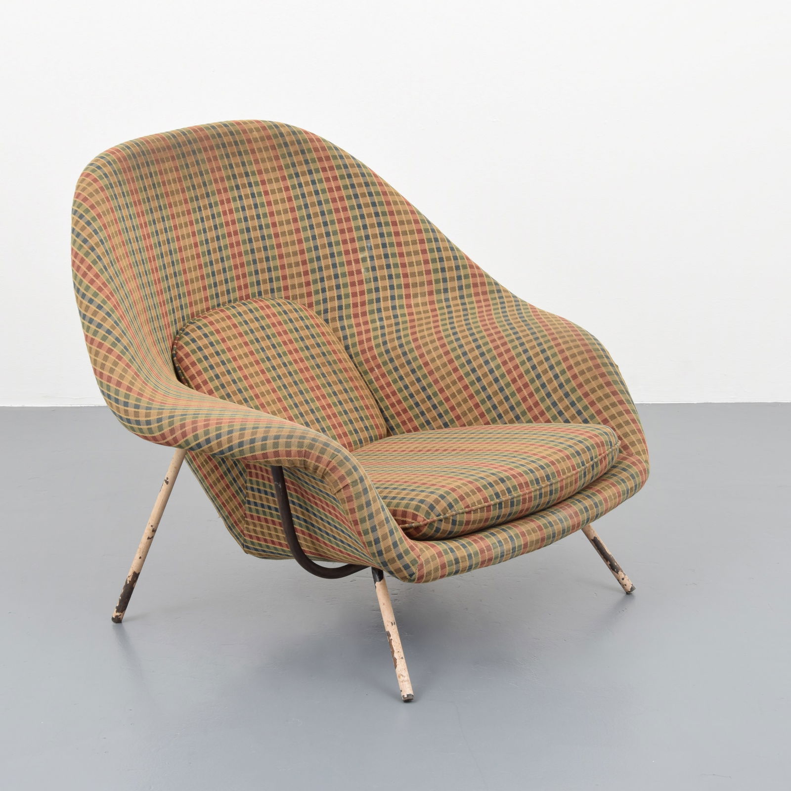 Early Eero Saarinen WOMB Chair: Artist/Designer; Manufacturer: Eero Saarinen (Finnish-American, 1910-1961); Knoll (USA)Marking(s); notes: no marking(s) apparentMaterials: enameled steel, upholsteryDimen