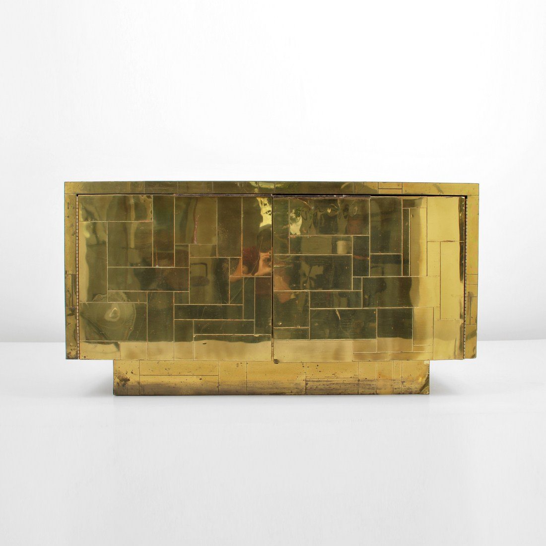 Paul Evans "Cityscape" Cabinet: Designer & Manufacturer: Paul Evans; Directional Markings: marked Country of Origin & Materials: USA; wood, brass Additional Information & Circa: "Cityscape" cabinet with 2 doors revealing a storage a