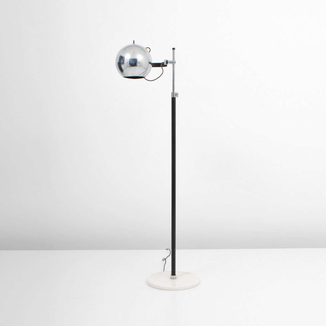 Italian Adjustable Floor Lamp, Arredoluce: Designer & Manufacturer: Arredoluce, Attributed Country of Origin & Materials: Italy; chrome, marble Additional Information & Circa: Italian floor lamp with adjustable head and stem attributed to Arre