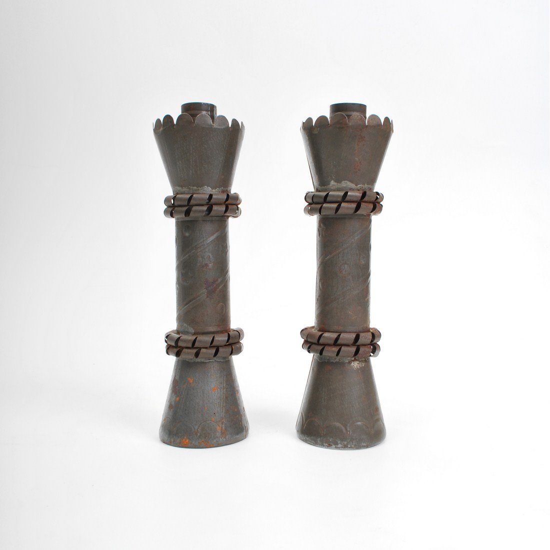 Pair of William Spratling Candlesticks: Designer & Manufacturer: William Spratling Markings: marked Country of Origin & Materials: Mexico; tin Additional Information & Circa: Pair of candlesticks by William Spratling c. 1935 (Key Word Searc