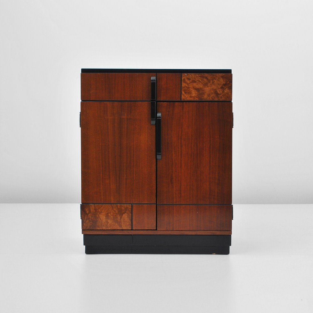 Donald Deskey Cabinet/Bar: Designer & Manufacturer: Donald Deskey Markings: none Country of Origin & Materials: USA; burl wood Additional Information & Circa: Cabinet/bar with a drawer and two doors revealing a shelf c. 1940 (K