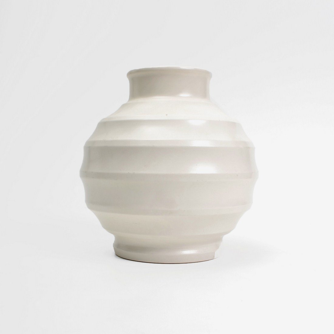 Keith Murray "Moonstone" Vase: Designer & Manufacturer: Keith Murray; Wedgwood Markings: marked Country of Origin & Materials: England; pottery Additional Information & Circa: "Moonstone" vase by Keith Murray c. 1940 Dimensions: 6.