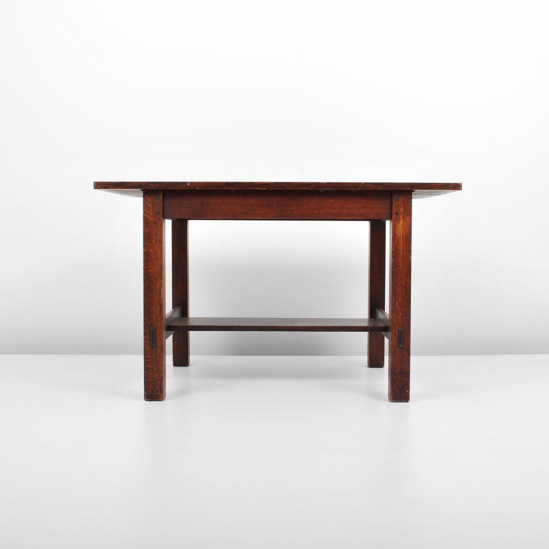 L&JG Stickley Library Table: Designer & Manufacturer: L&JG Stickley Markings: none Country of Origin & Materials: USA; oak Additional Information & Circa: Library table with pegs, thru-tenons and key & tenon by L&JG Stickley c. 1