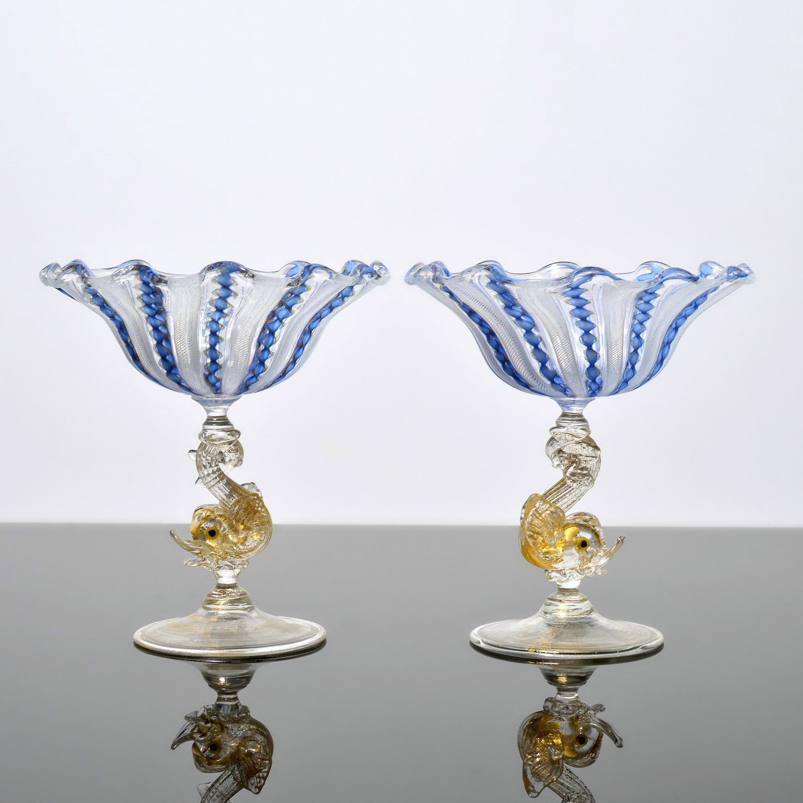 2 Salviati & Co. FILIGRANA Dolphin Stem Compotes / Vessels, Murano: Artist/Designer; Manufacturer: Salviati & Co. (Italy) Marking(s); notes: no marking(s) apparent Materials: glass Dimensions (H, W, D): 