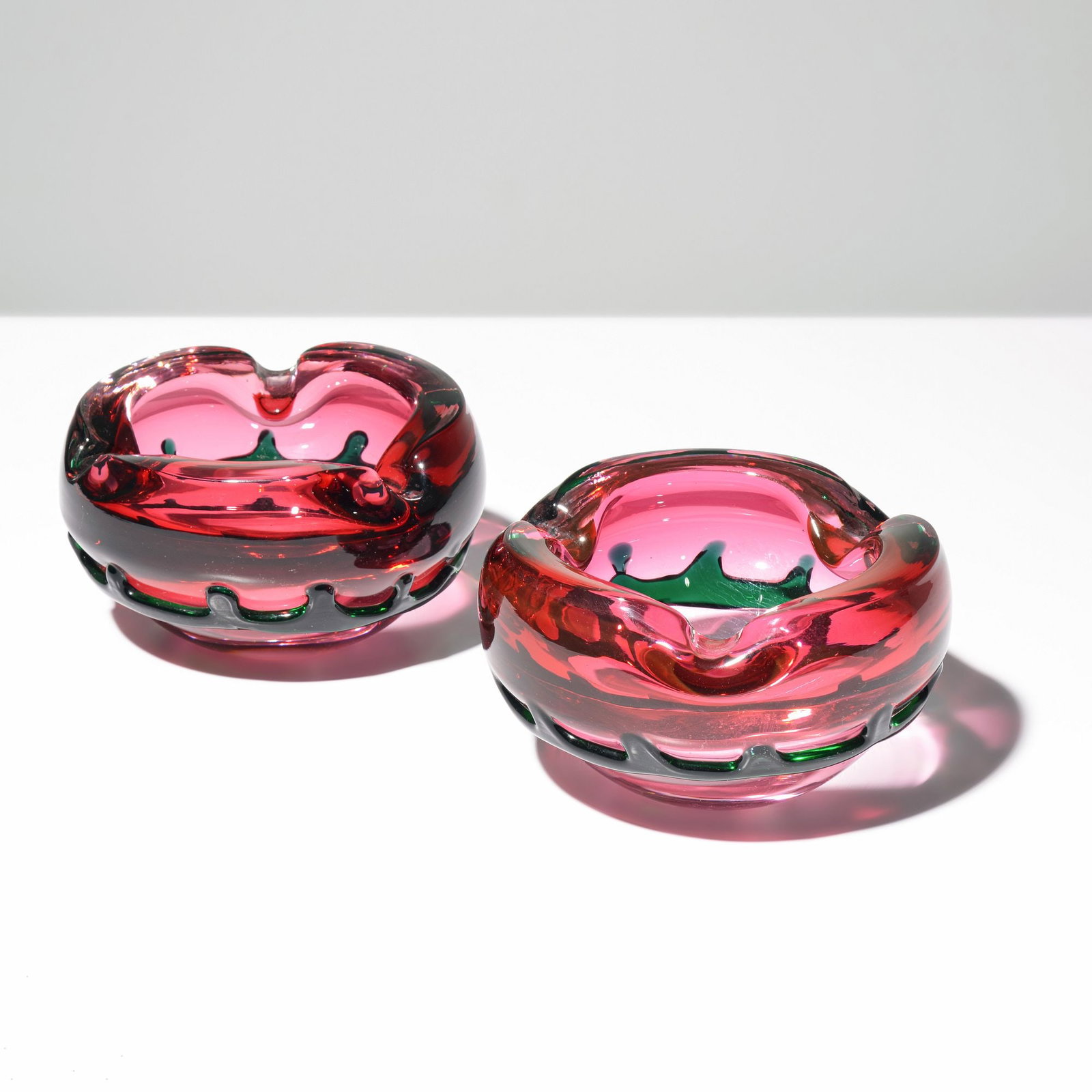 2 Fratelli Toso Ashtrays / Bowls, Murano: Artist/Designer; Manufacturer: Fratelli Toso (Italy) Marking(s); notes: no marking(s) apparent Materials: glass Dimensions (H, W, D): 3.5"h, 6"dia