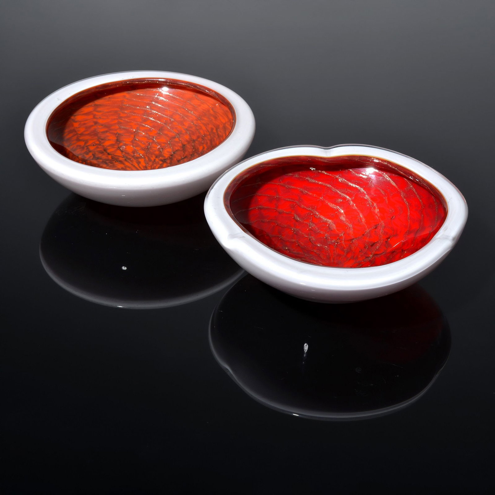 2 Fratelli Toso Bowls / Ashtrays, Murano: Artist/Designer; Manufacturer: Fratelli Toso (Italy) Marking(s); notes: no marking(s) apparent Materials: glass Dimensions (H, W, D): largest: 2