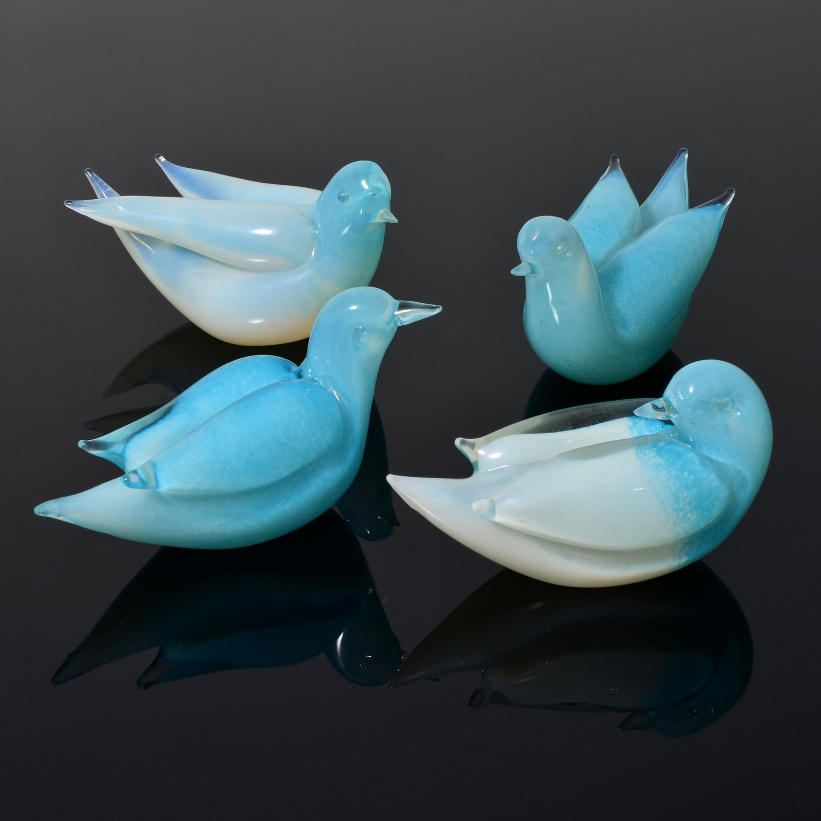 4 Fratelli Toso Bird Sculptures, Murano: Artist/Designer; Manufacturer: Fratelli Toso (Italy) Marking(s); notes: label (1) Materials: glass Dimensions (H, W, D): largest: 3"h, 5.5"