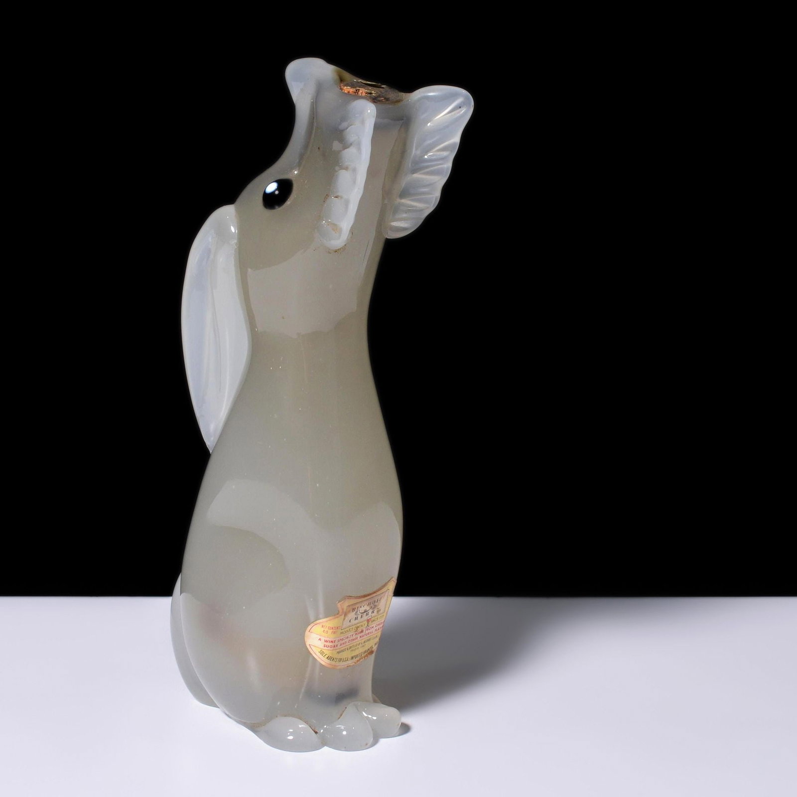 Archimede Seguso ALABASTRO Dog Sculpture / Bottle, Murano: Artist/Designer; Manufacturer: Archimede Seguso (Italian, 1909-1999)Marking(s); notes: Bischoff Cherry Wine label, remnants of labelMaterials: glassDimensi