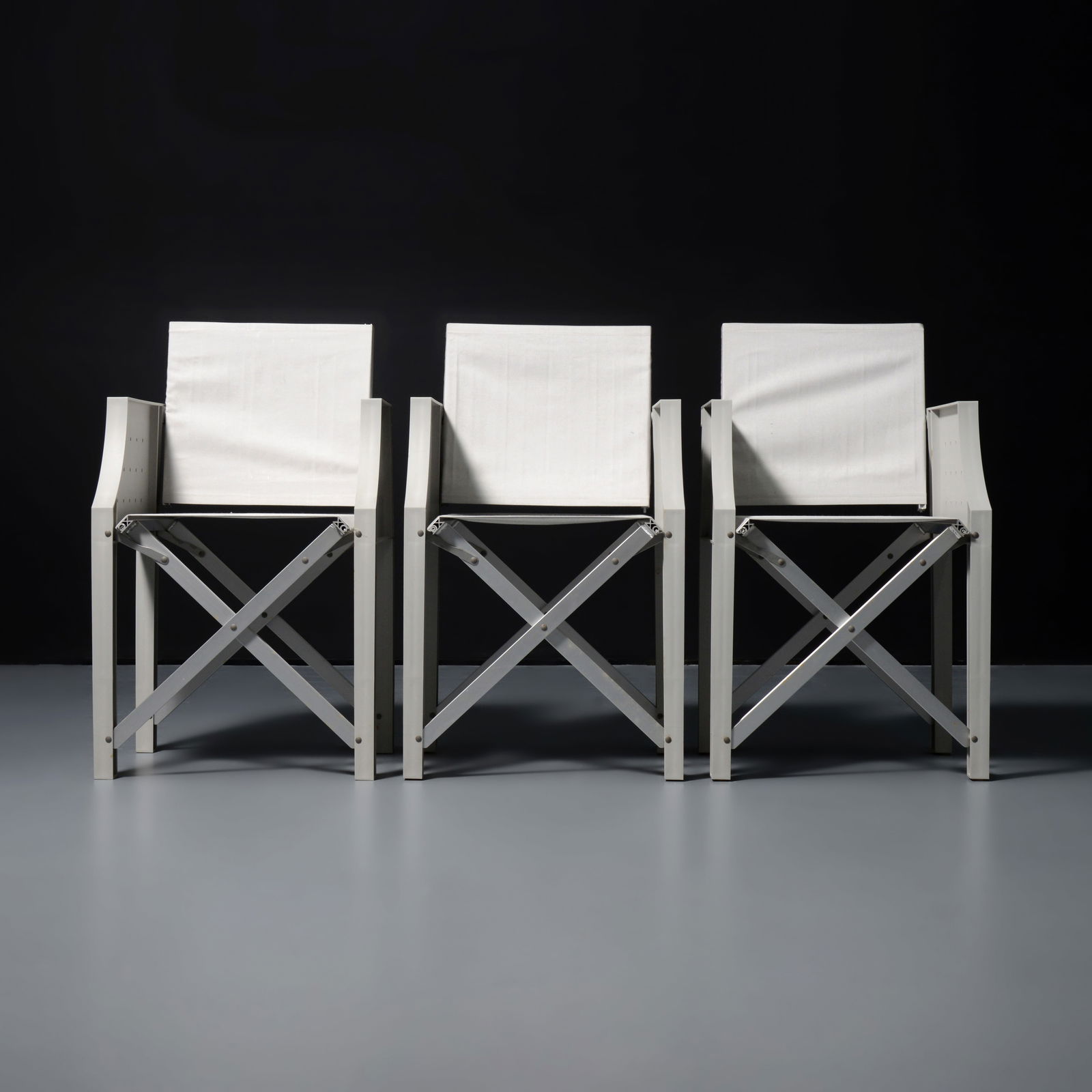 3 Philippe Starck SAINT ETHIC Chairs: Artist/Designer; Manufacturer: Philippe Starck (French, b. 1949); XO (France), Luminaire (Retailer, USA)Marking(s); notes: signed, marking(s)Materials: plastic, fabric<