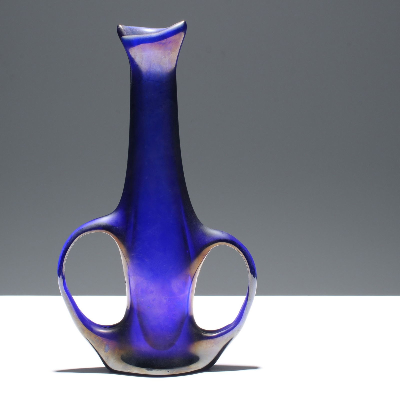 Giorgio Ferro ANSE VOLANTE Vase, 12.75"H, Murano: Artist/Designer; Manufacturer: Giorgio Ferro (Italian, 20th Century); Arte Vetraria Muranese (A.V.E.M.) (Italy)Marking(s); notes: no marking(s) apparentMaterials: glass<