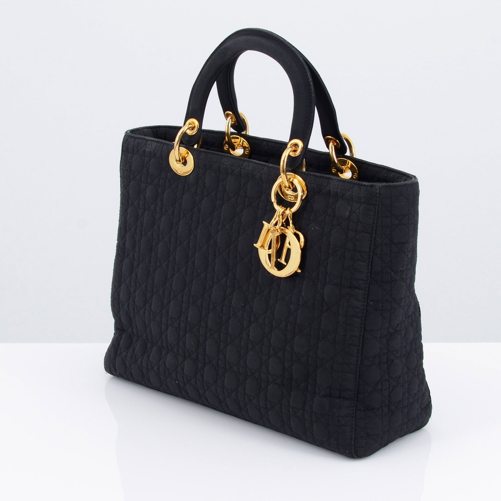 Christian Dior LADY DIOR Cannage Nylon Bag: Artist/Designer; Manufacturer: Christian Dior (France) Marking(s); notes: Christian Dior labels and imprints Materials: nylon, fabric, metal Dime