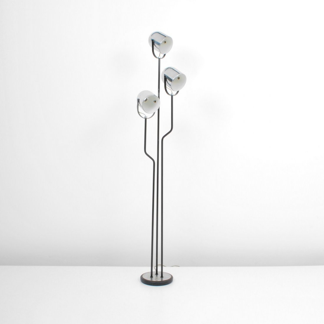 Reggiani Floor Lamp: Designer & Manufacturer: Reggiani Markings: none Country of Origin & Materials: Italy; chrome, enameled metal Additional Information & Circa: Floor lamp with 3 adjustable heads by Reggiani; c. 1970 (K