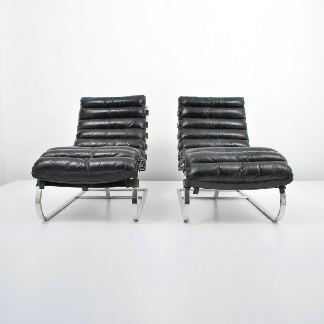Rare Pair of Michel Boyer Lounge Chairs: Designer & Manufacturer: Michel Boyer Markings: none Country of Origin & Materials: France; chromed steel, leather Additional Information & Circa: Rare pair of leather lounge chairs by Michel Boyer; c