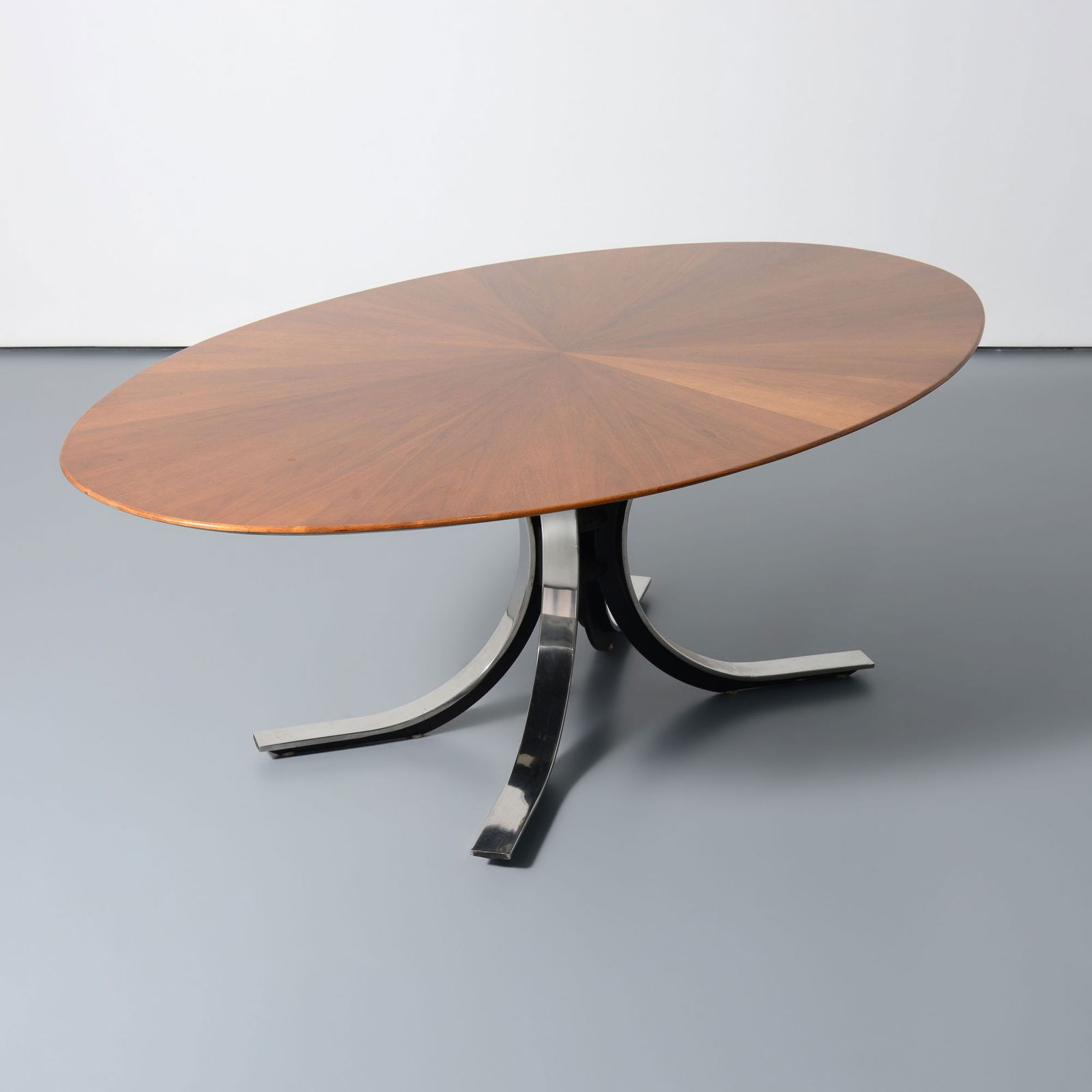 Osvaldo Borsani Dining Table: Artist/Designer; Manufacturer: Osvaldo Borsani (Italian, 1911-1985); Stow Davis (USA)Marking(s); notes: Stow Davis plaqueMaterials: chromed metal, walnutDimensi