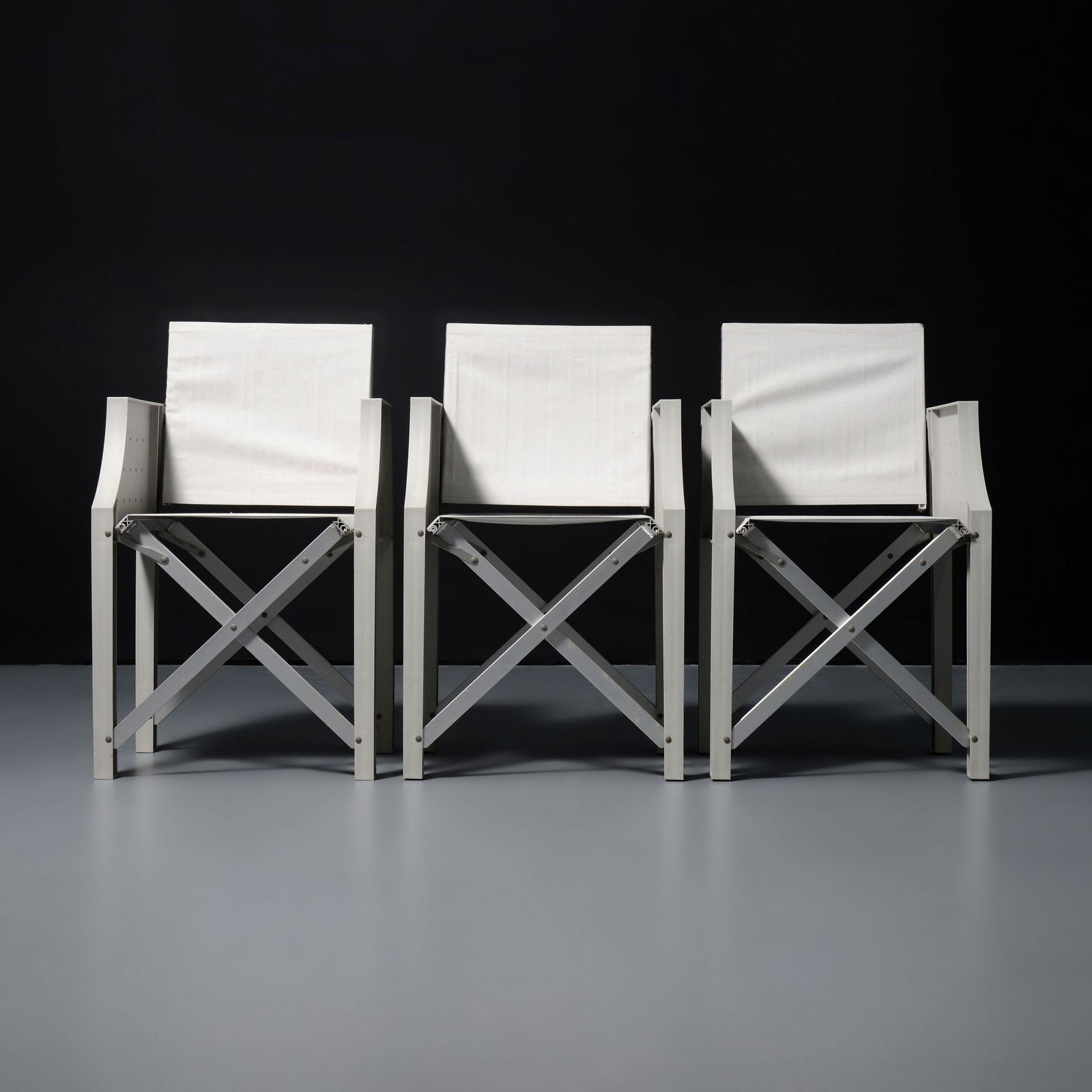 3 Philippe Starck SAINT ETHIC Chairs: Artist/Designer; Manufacturer: Philippe Starck (French, b. 1949); XO (France), Luminaire (Retailer, USA)Marking(s); notes: signed, marking(s)Materials: plastic, fabric<