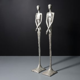 Pair of Raymond Waites Figural Sculptures, 86"H