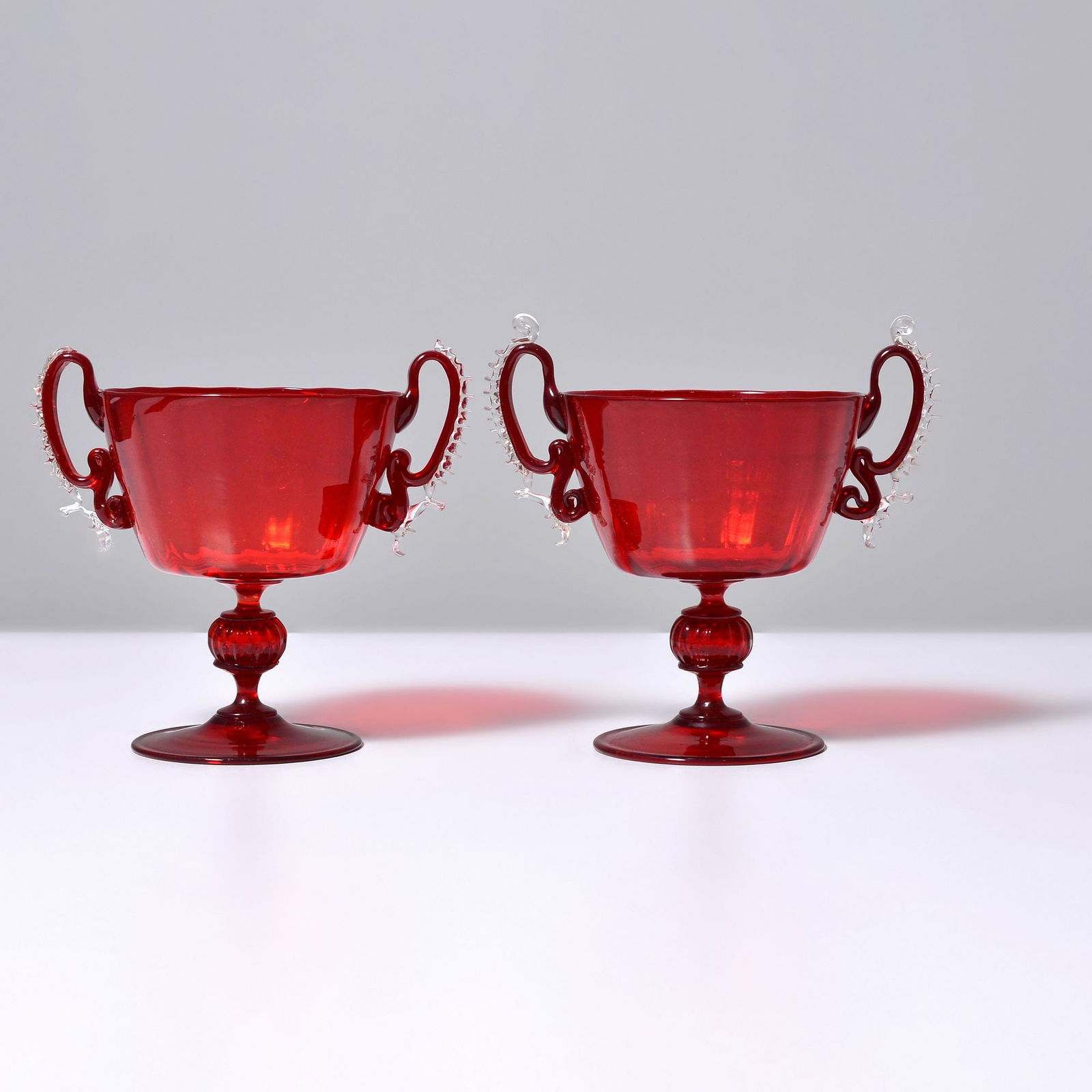 2 Salviati & Co. Chalices / Handled Vessels, Murano: Artist/Designer; Manufacturer: Salviati & Co. (Italy)Marking(s); notes: no marking(s) apparentMaterials: glassDimensions (H, W, D): 6"h,
