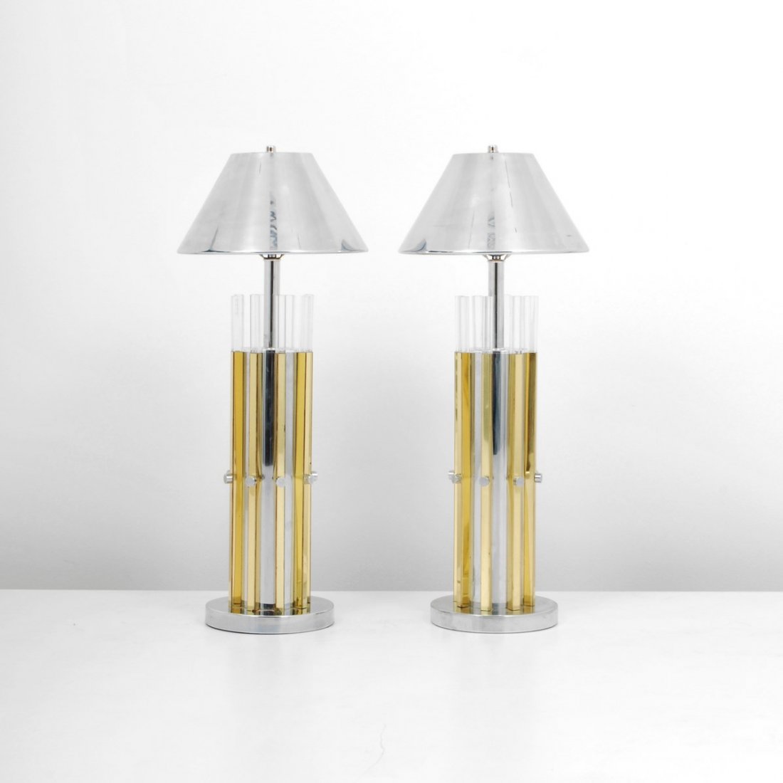 Pair of Lamps, Charles Hollis Jones: Designer & Manufacturer: Charles Hollis Jones, Attributed Markings: none Country of Origin & Materials: USA; chrome, brass, acrylic Additional Information & Circa: Pair of chrome and brass table lamps