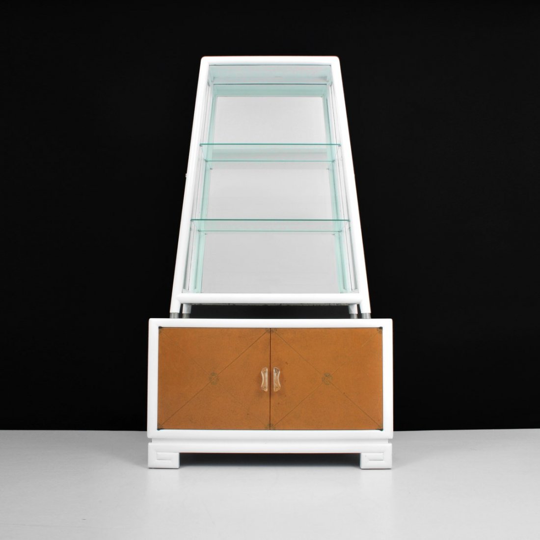 Grosfeld House Display Cabinet: Designer & Manufacturer: Grosfeld House Markings: none Country of Origin & Materials: USA; wood, glass, leather Additional Information & Circa: Fine pyramid display cabinet by Grosfeld House. Glass sh