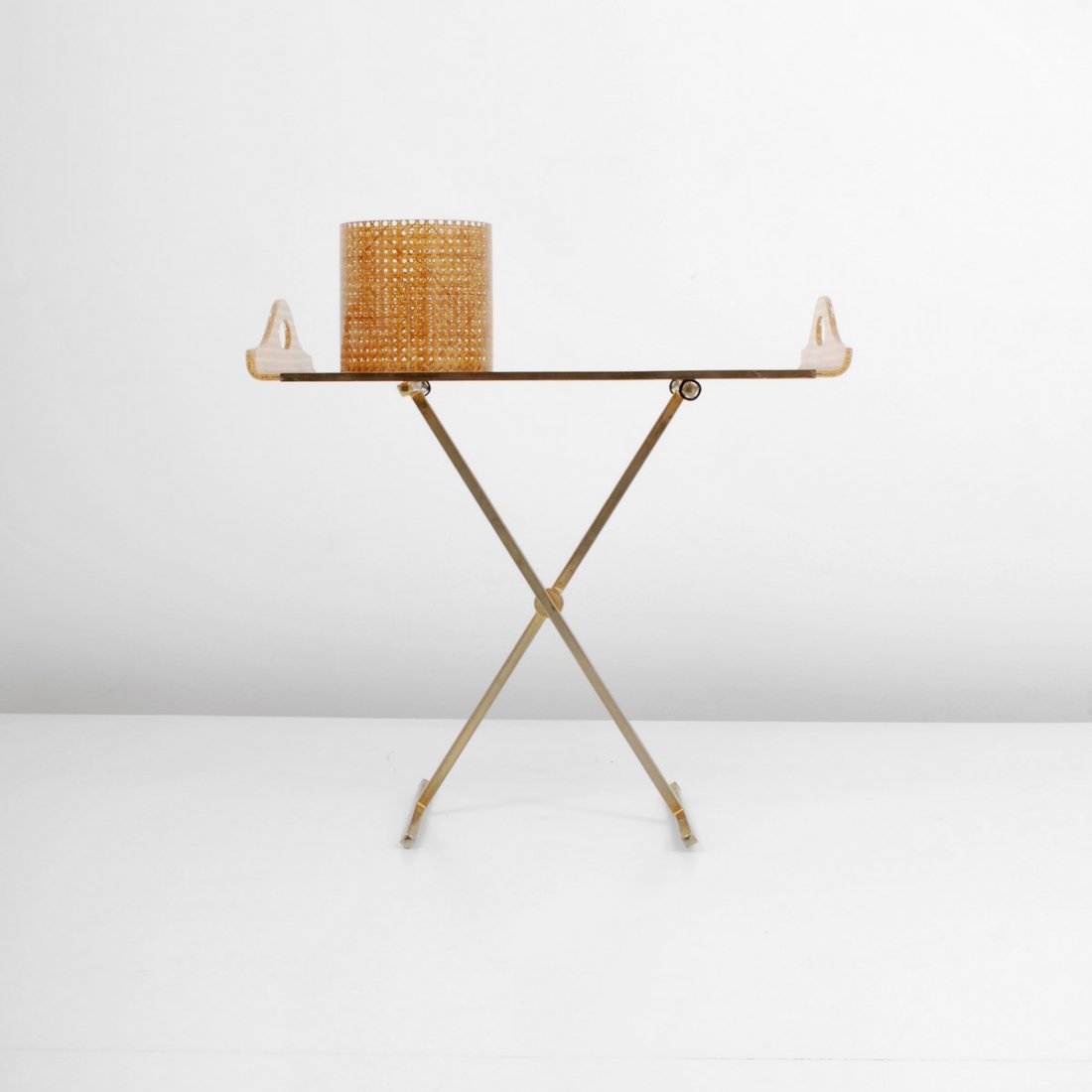 Gabriella Crespi Serving Table: Designer & Manufacturer: Gabriella Crespi Markings: partial label Country of Origin & Materials: Italy; brass, caning, lucite Additional Information & Circa: Serving table with removable tray and ice