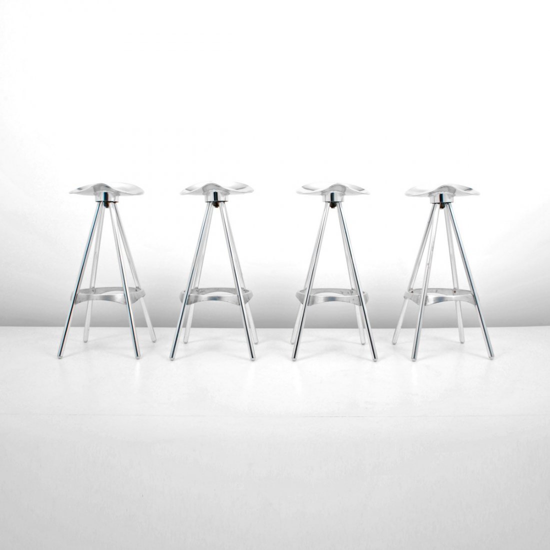 AMAT-3 "Twist" Bar Stools, Set of 4: Designer & Manufacturer: AMAT-3; Knoll International Markings: none Country of Origin & Materials: USA; aluminum Additional Information & Circa: Set of four swivel "Twist" barstools by AMAT-3; d. 1993