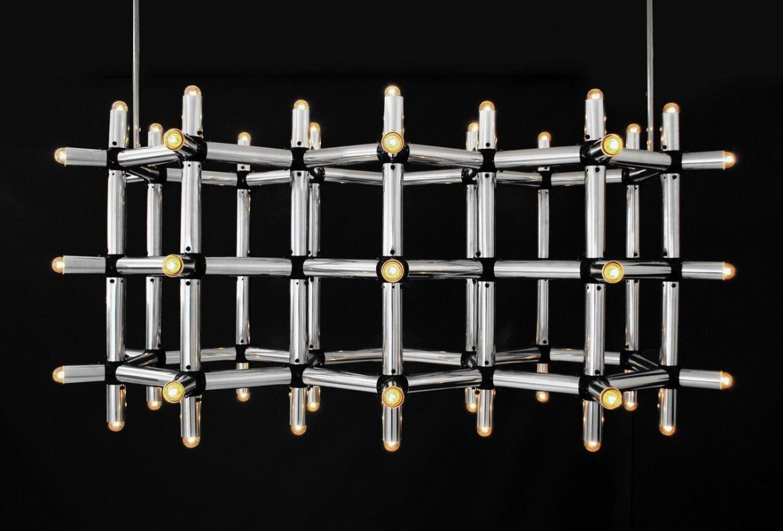 Massive Robert Haussmann "Atom" Chandelier: Designer & Manufacturer: Robert Haussmann; Swiss Lamp International Markings: none Country of Origin & Materials: Switzerland; chromed metal, other Additional Information & Circa: Massive "Atom" chand