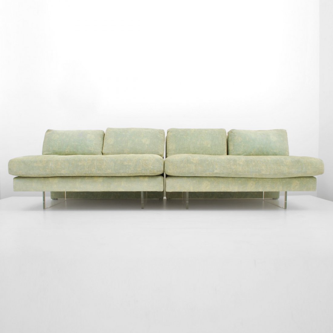 Pair of Vladimir Kagan "Omnibus" Loveseats: Designer & Manufacturer: Vladimir Kagan; Vladimir Kagan Designs Inc. Markings: marked Country of Origin & Materials: USA; lucite, upholstery Additional Information & Circa: Pair of "Omnibus" sofas/lov