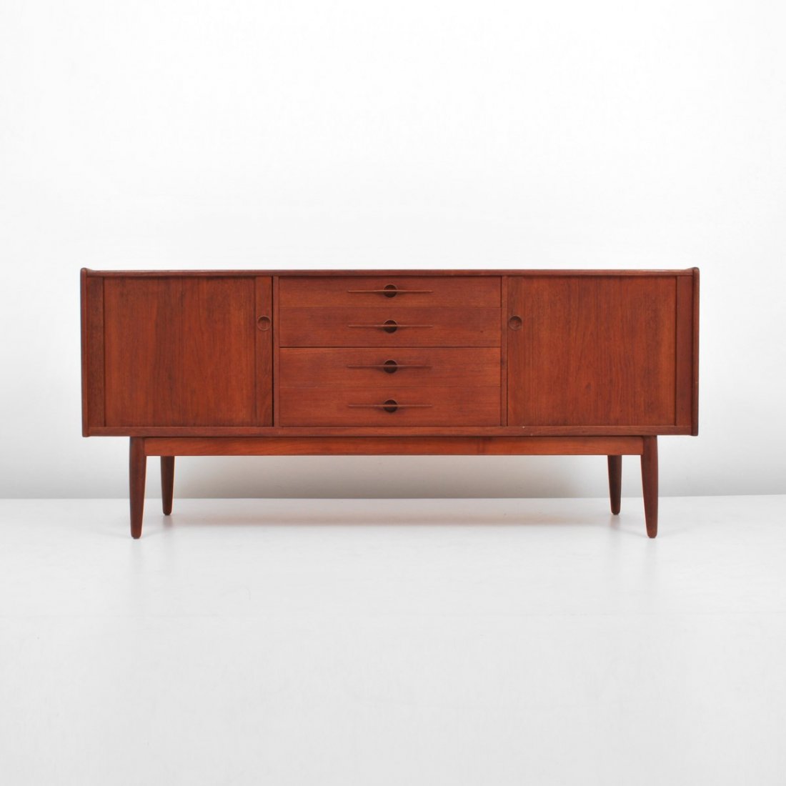 Lyby Mobler Cabinet, Arne Vodder: Designer & Manufacturer: Arne Vodder, Manner of; Lyby Mobler Markings: marked Country of Origin & Materials: Denmark; teak Additional Information & Circa: Teak cabinet with four drawers and two tambou