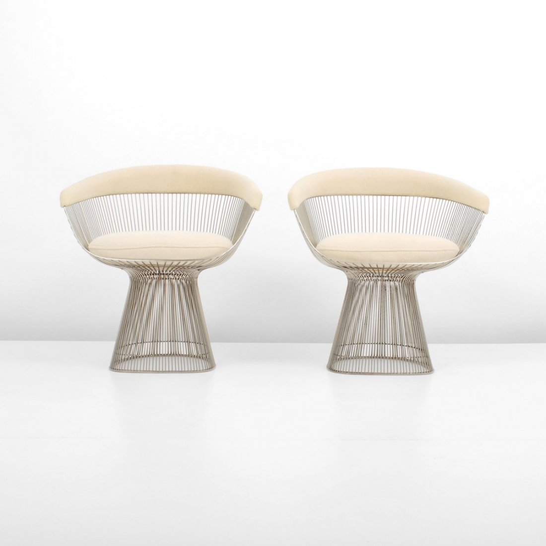 Pair of Warren Platner Chairs: Designer & Manufacturer: Warren Platner; Knoll International Markings: marked; dated Country of Origin & Materials: USA; chrome-plated steel, upholstery Additional Information & Circa: Pair of side/lo