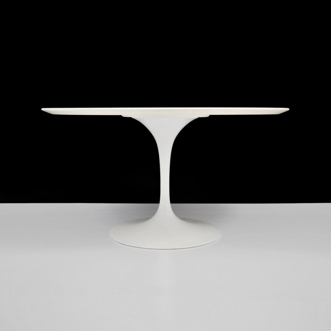 Eero Saarinen "Tulip" Dining Table: Designer & Manufacturer: Eero Saarinen; Knoll International Markings: marked Country of Origin & Materials: USA; mica, metal Additional Information & Circa: "Tulip" dining/center hall table by Eero Sa