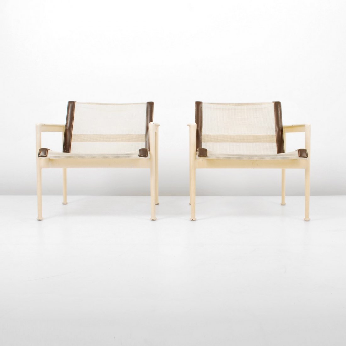 Pair of Richard Schultz Arm Chairs: Designer & Manufacturer: Richard Schultz; Knoll Associates Markings: none Country of Origin & Materials: USA; aluminum, leather, mesh Additional Information & Circa: Pair of outdoor lounge chairs by R