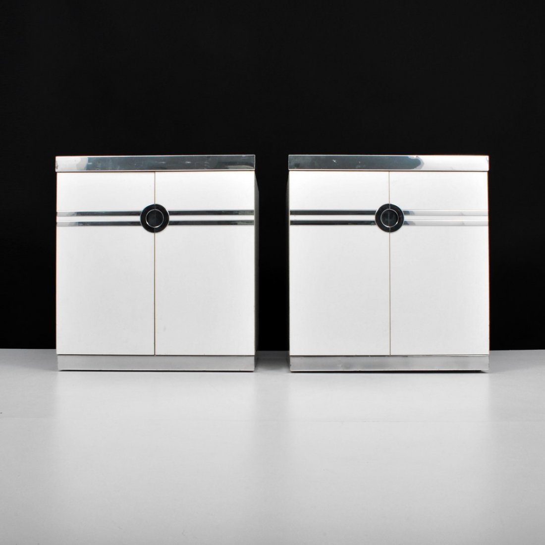 Pair of Pierre Cardin Nightstands: Designer & Manufacturer: Pierre Cardin Markings: marked Country of Origin & Materials: France; laminate, chrome Additional Information & Circa: Pair of Pierre Cardin nightstands/cabinets. Each cabinet