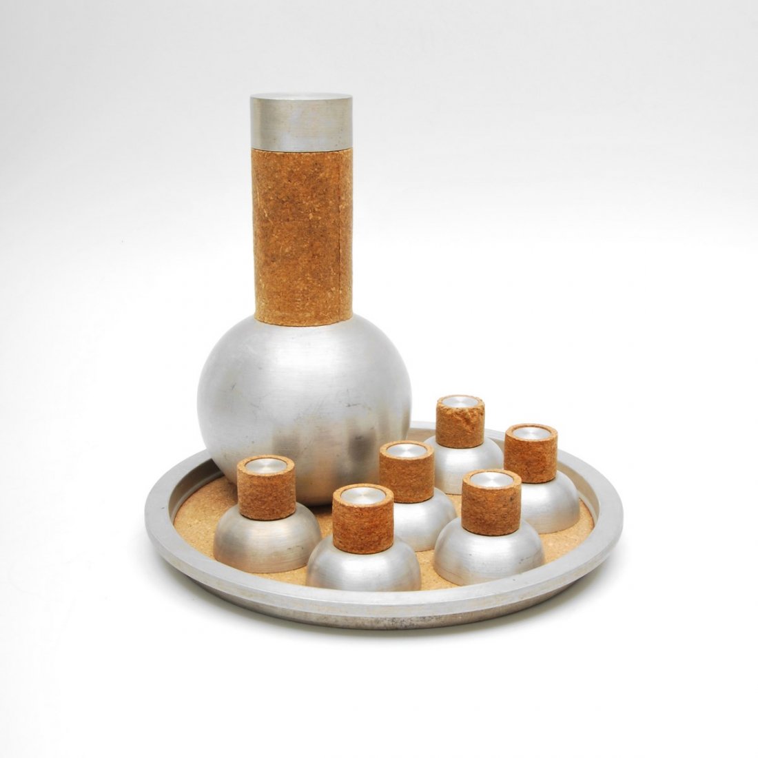 Rare Russel Wright Cocktail Set: Designer & Manufacturer: Russel Wright; Russel Wright Inc. Markings: marked Country of Origin & Materials: USA; aluminum, cork Additional Information & Circa: Rare cocktail set in spun aluminum and co