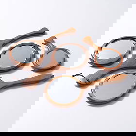 4 Hand Carved Mirrors, Manner of James Prestini: Artist/Designer; Manufacturer: James Prestini, manner ofMarking(s); notes: no marking(s) apparentMaterials: wood, mirrorDimensions (H, W, D): larg