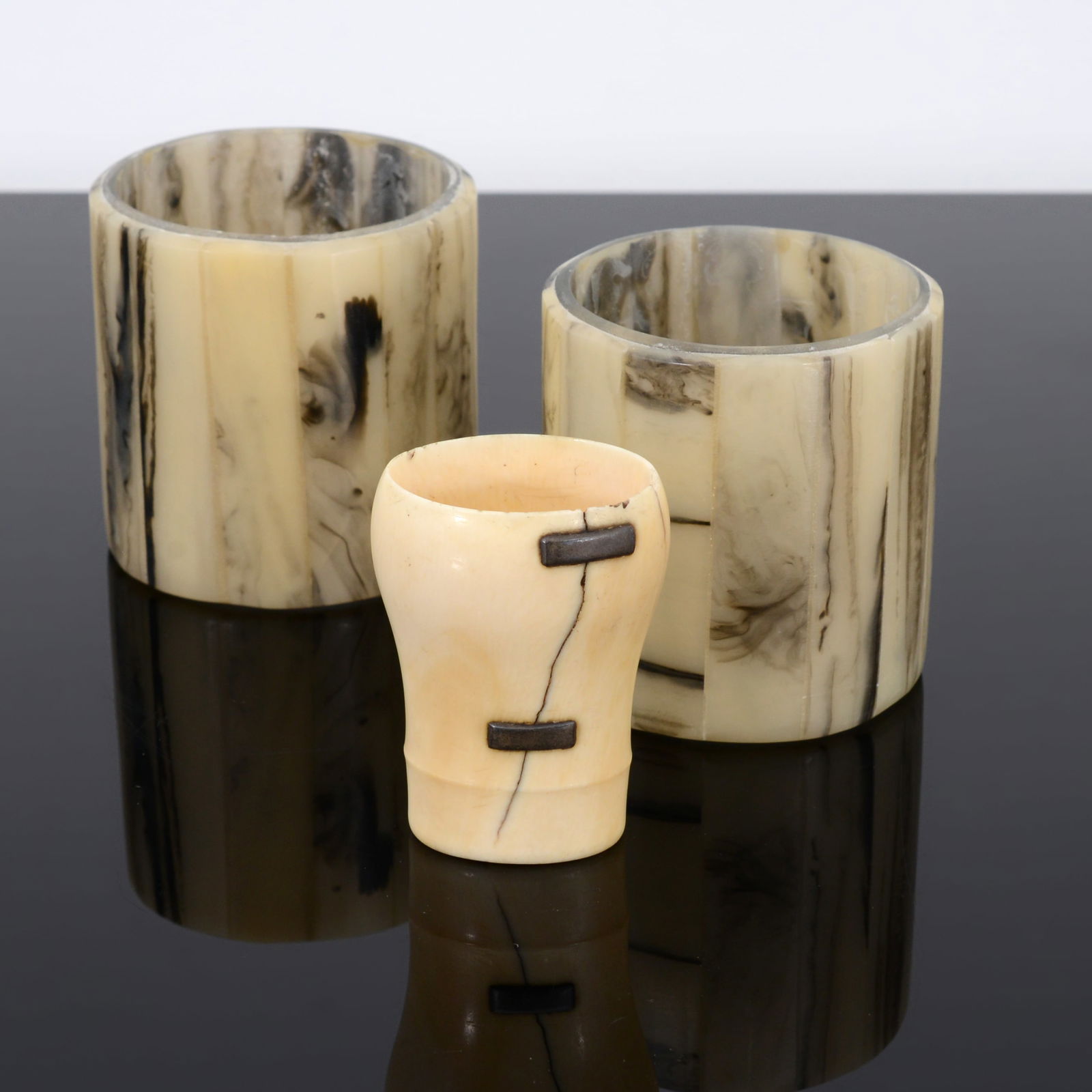 3 Bone Vessels / Vases: Artist/Designer; Manufacturer: unknownMarking(s); notes: no marking(s) apparentMaterials: bone (1), glass with bone overlay (2)Dimensions (H, W, D): <