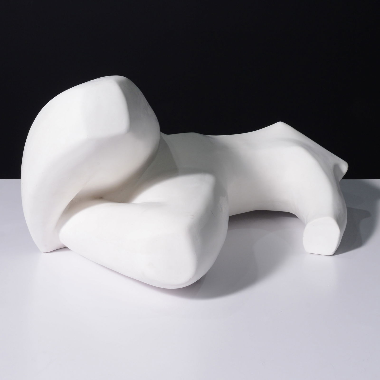 Nude Torso Sculpture, Manner of Jean Arp, 23"W: Artist/Designer; Manufacturer: Jean Arp (German-French, 1886-1966)Marking(s); notes: no marking(s) apparentMaterials: matte glazed ceramicDimensions (H, W, D):&