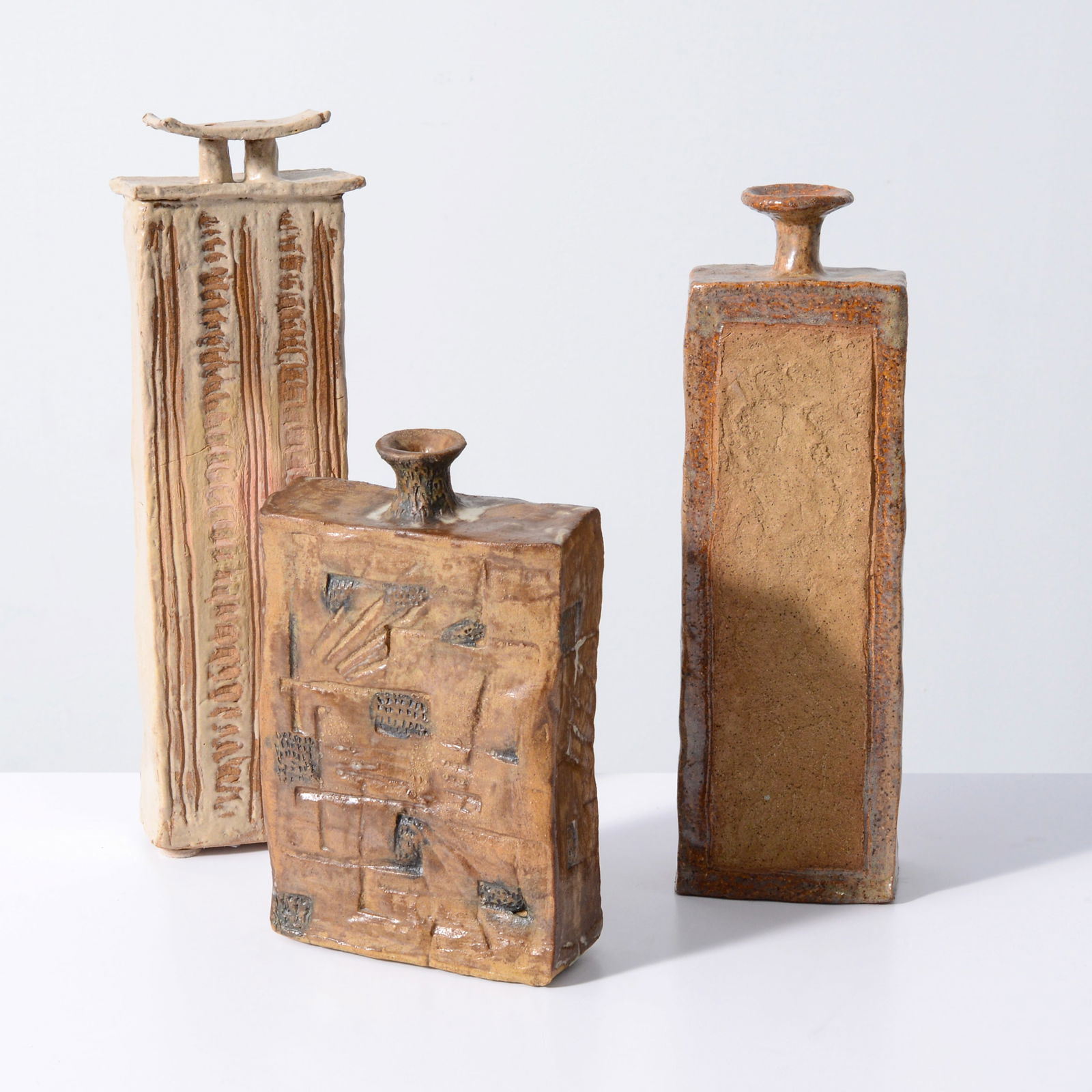 3 Patti Greer Vases / Vessels: Artist/Designer; Manufacturer: Patti Greer (20th Century)Marking(s); notes: marking(s) Materials: ceramicDimensions (H, W, D): largest: