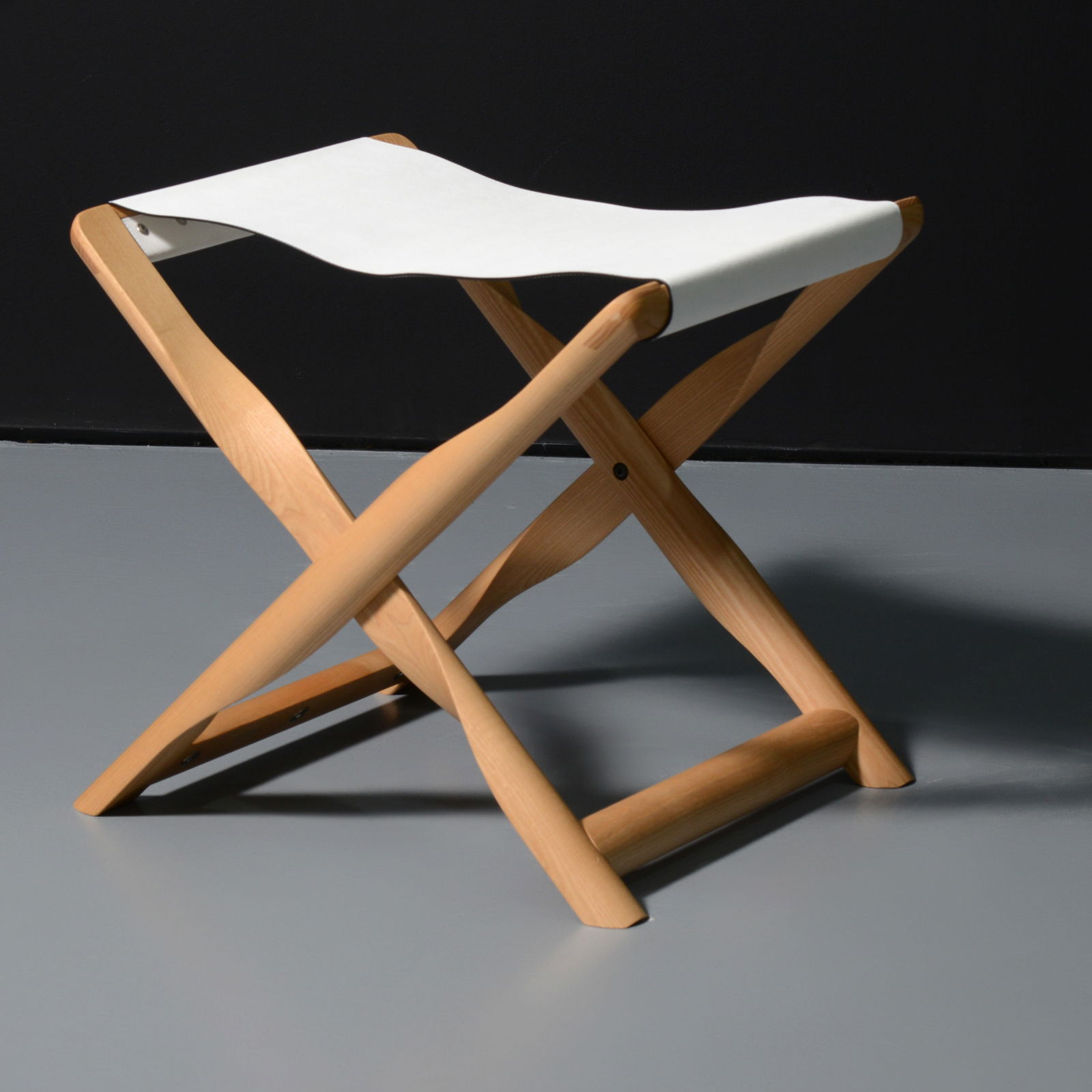 Kaare Klint PROPELLER Stool: Artist/Designer; Manufacturer: Kaare Klint (Danish, 1888-1954); Giobagnara (Italy)Marking(s); notes: Giobagnara imprintMaterials: oak, leatherDimensions (H