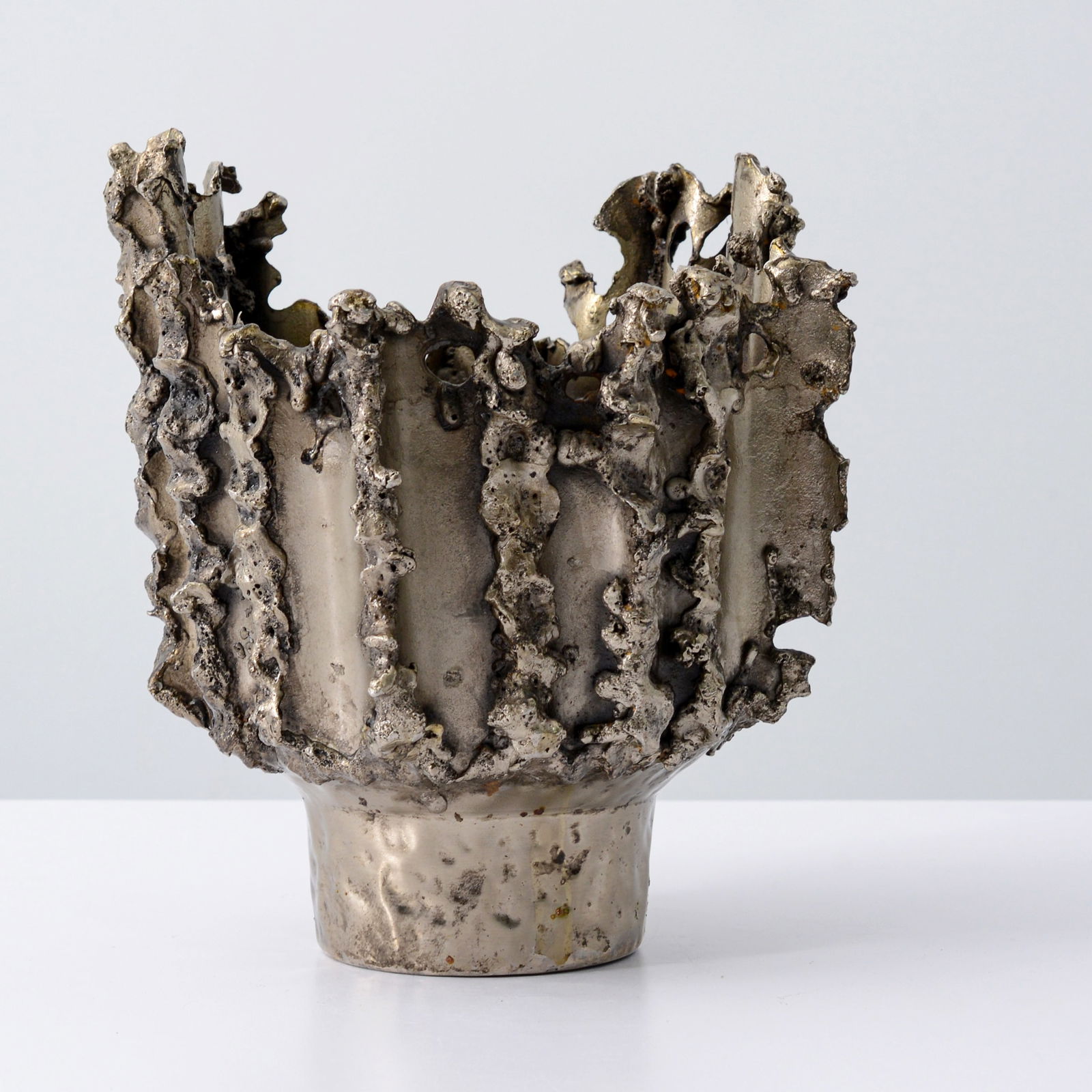 Brutalist Vase, Manner of Marcello Fantoni: Artist/Designer; Manufacturer: Marcello Fantoni (Italian, 1915-2011), manner ofMarking(s); notes: no marking(s) apparentMaterials: patinated steelDimension