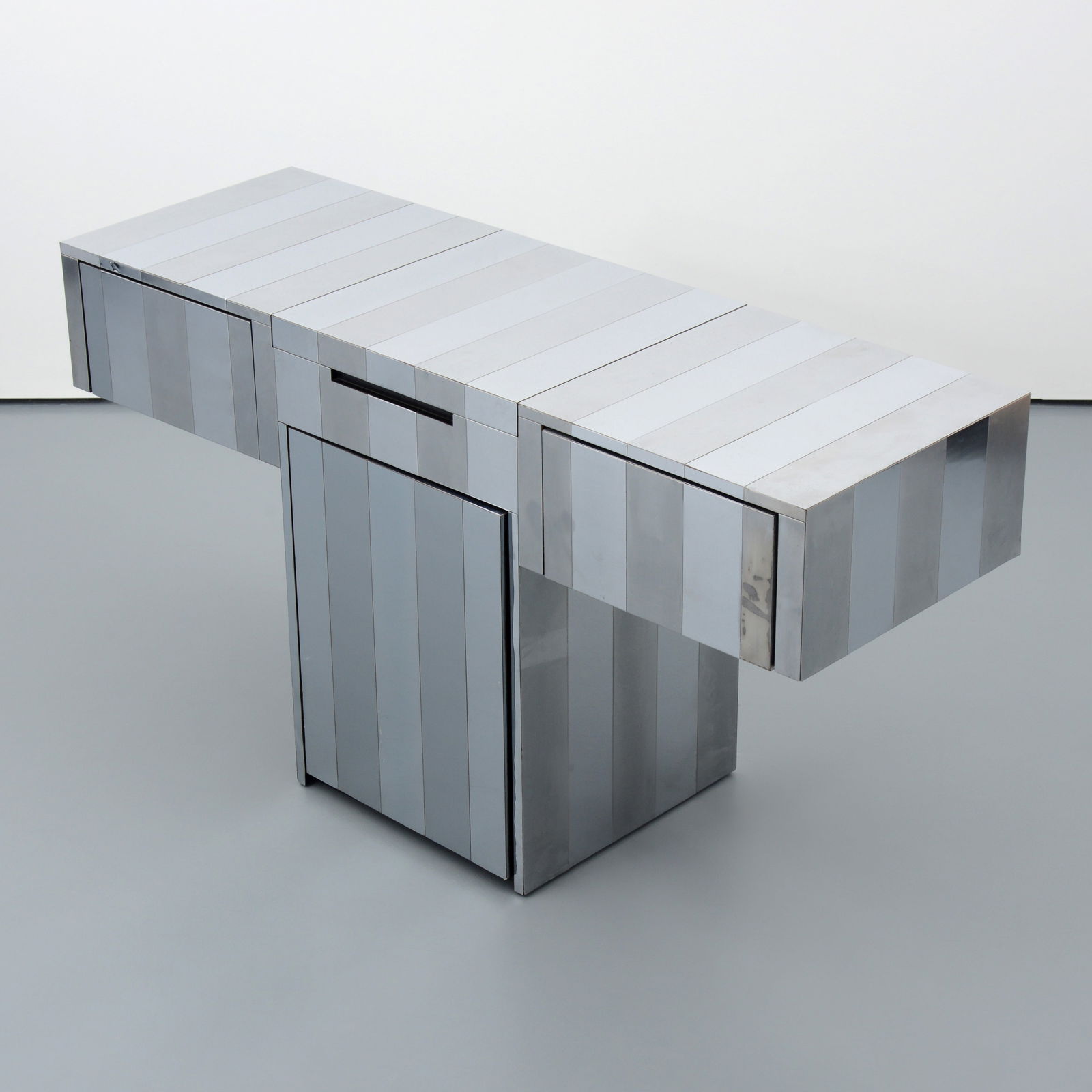 CITYSCAPE Console / Server / Bar, Manner of Paul Evans: Artist/Designer; Manufacturer: Paul Evans (American, 1931-1987), manner of; Paul Evans Studio for Directional (USA), manner ofMarking(s); notes: no marking(s) apparentMaterials: chrome