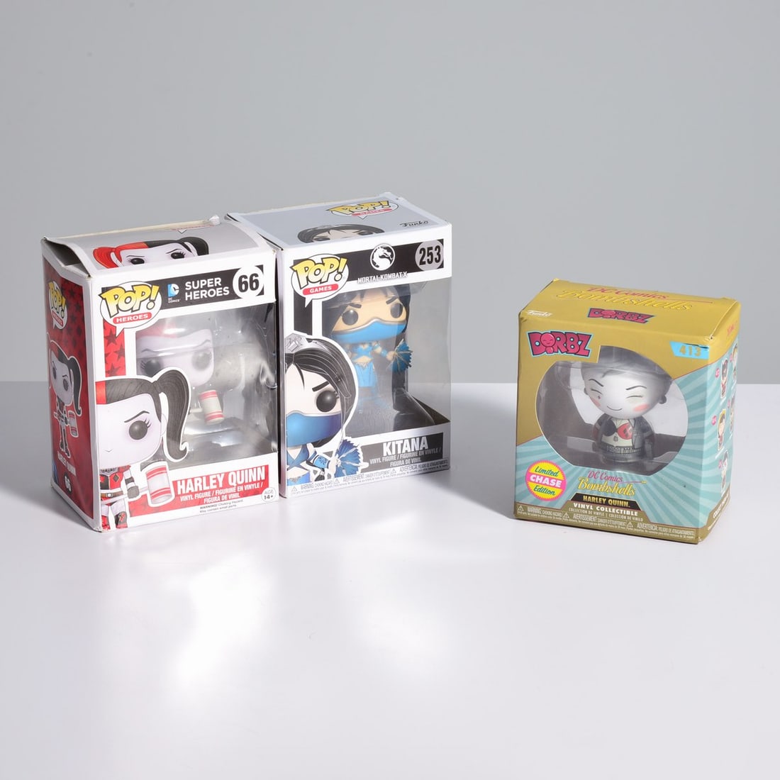 2 Funko Pop Figurines & 1 Funko Dorbz Figurine: Artist/Designer; Manufacturer: Mike Becker (American, 20th Century); Funko(USA), Warner Bros. Entertainment Inc. (USA), DC Comics (USA)Marking(s); notes: marking(s)Materials: painted c