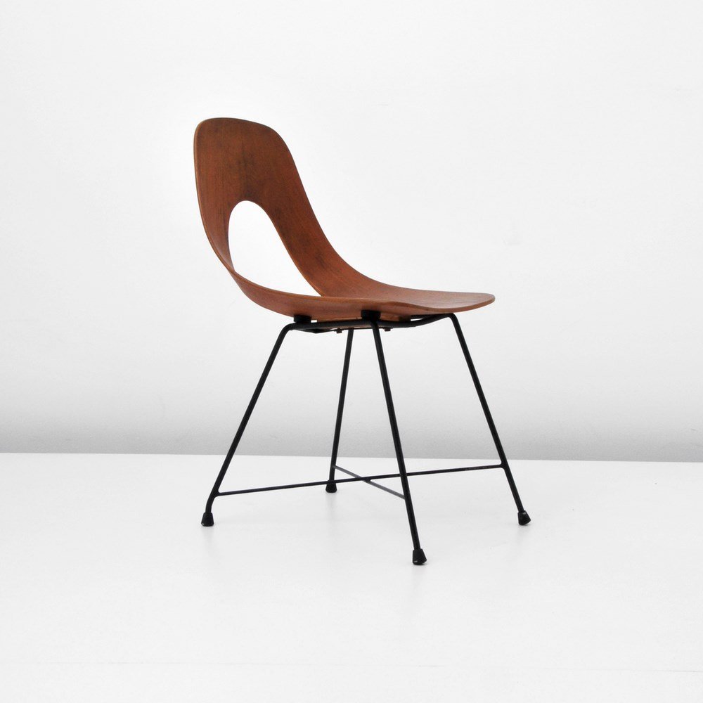 Augusto Bozzi "Ariston" Chair: Designer & Manufacturer: Augusto Bozzi; Saporiti Markings: marked Country of Origin & Materials: Italy; teak, iron Additional Information & Circa: "Ariston" chair by Augusto Bozzi (1924-1982). The cha
