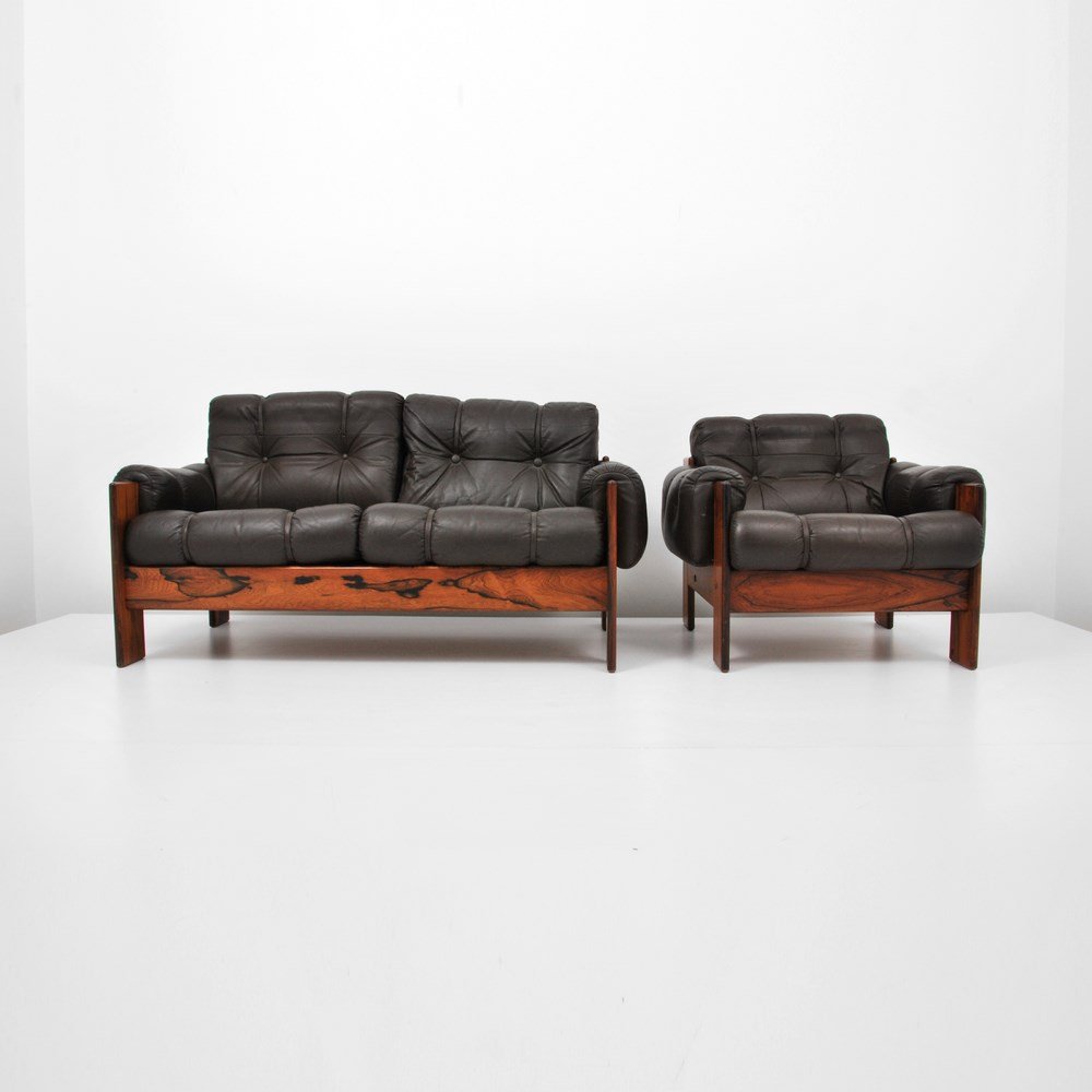 Uu-Vee Kaluste Oy Rosewood & Leather Sofa & Chair: Designer & Manufacturer: Uu-Vee Kaluste Oy Markings: marked Country of Origin & Materials: Finland; rosewood, leather Additional Information & Circa: Rosewood and leather loveseat and lounge chair by 